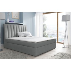 Luxurious and comfortable Rene continental bed with a storage compartment for bedding.