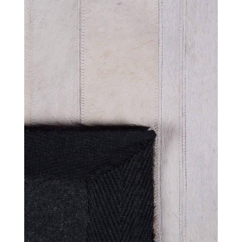 Dywan skórzany 140 x 200 cm czarno-beżowy DALYAN