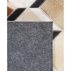 Dywan patchwork skórzany 140 x 200 cm brązowy SERINOVA