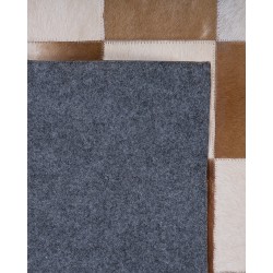 Dywan skórzany 140 x 200 cm brązowo-beżowy SOLMAZ