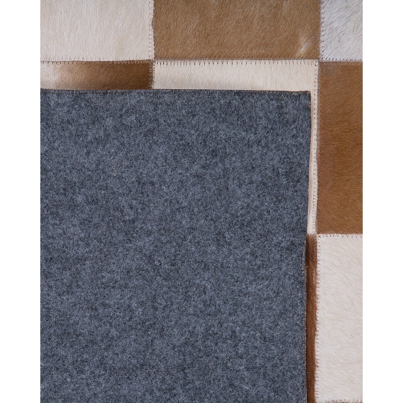 Dywan skórzany 140 x 200 cm brązowo-beżowy SOLMAZ