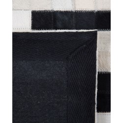 Dywan skórzany 80 x 150 cm czarno-biały BOLU