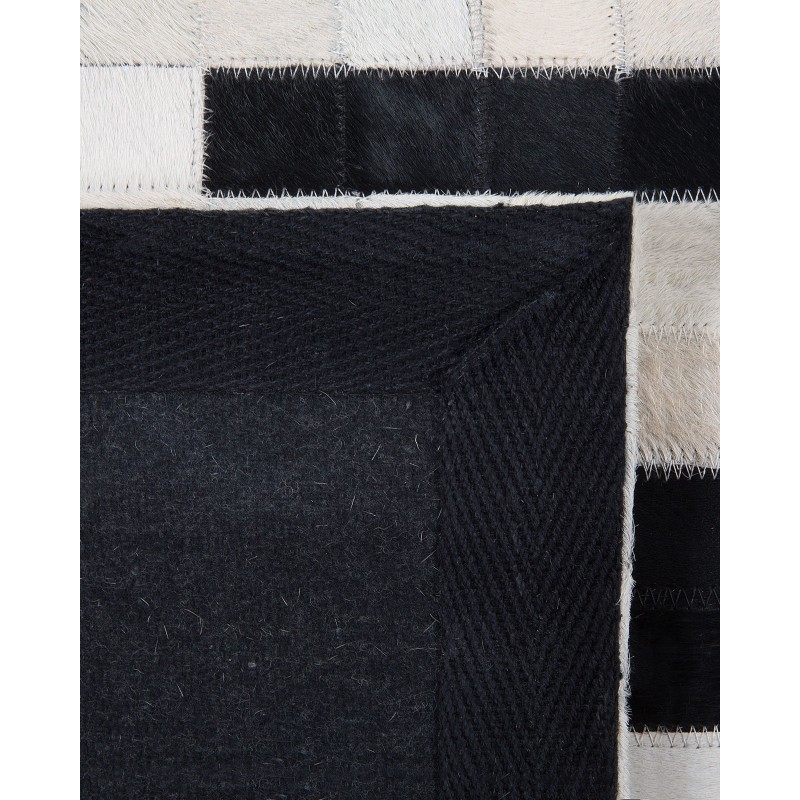 Dywan skórzany 80 x 150 cm czarno-biały BOLU