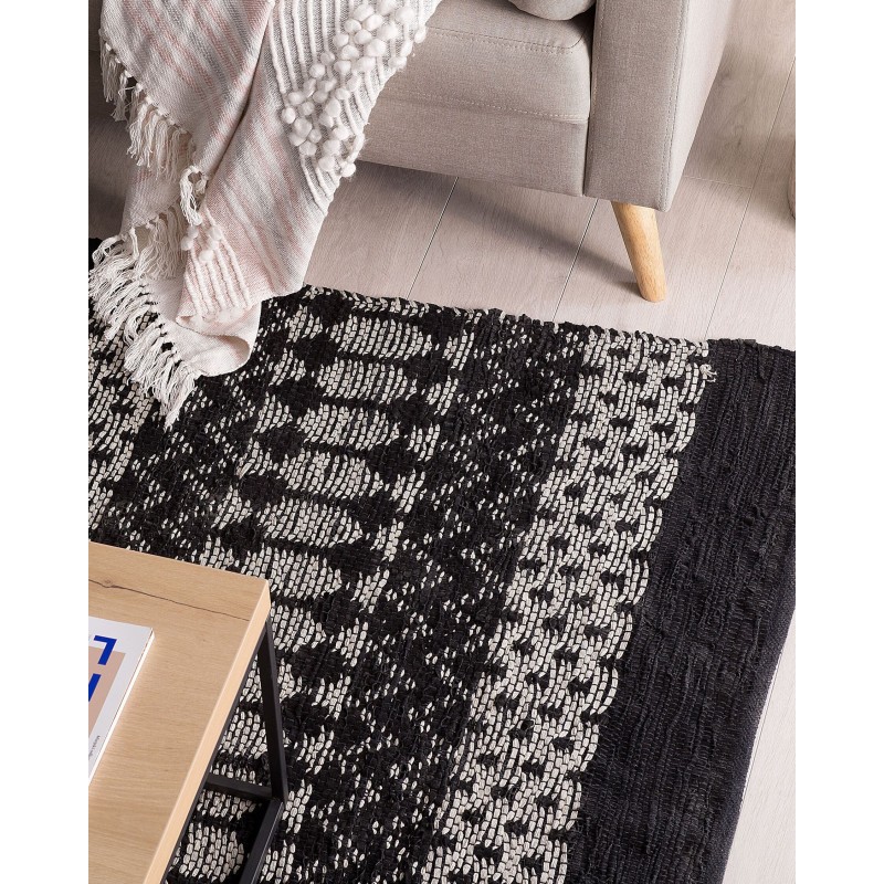 Dywan skórzany 140 x 200 cm czarny z beżowym SOKUN